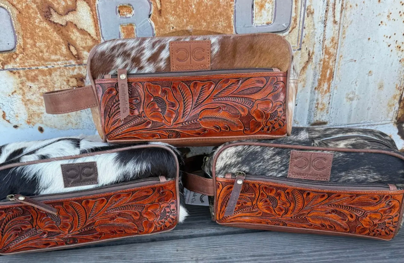 TOOLED LEATHER AND COWHIDE TOILETRY BAG