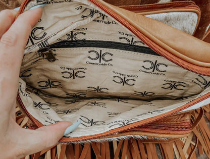 COWHIDE SLING BAG