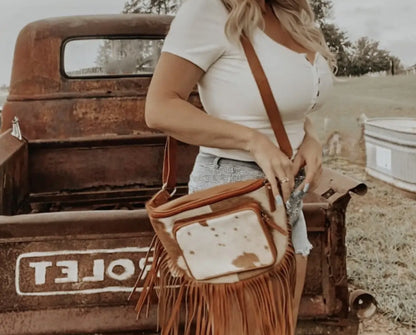 COWHIDE SLING BAG